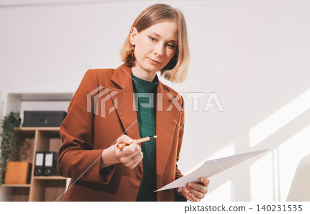 Fashion designer woman and typing on laptop in shop for email project or online order of fabric in creative startup Serious tailor computer and small business for clothes or textile in : Generative AI Fashion designer woman and typing on laptop in shop for email project or online order of fabric in creative startup Serious tailor computer and small business for clothes or textile in : Generative AI 140231535