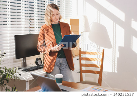 Fashion designer woman and typing on laptop in shop for email project or online order of fabric in creative startup Serious tailor computer and small business for clothes or textile in : Generative AI Fashion designer woman and typing on laptop in shop for email project or online order of fabric in creative startup Serious tailor computer and small business for clothes or textile in : Generative AI 140231537