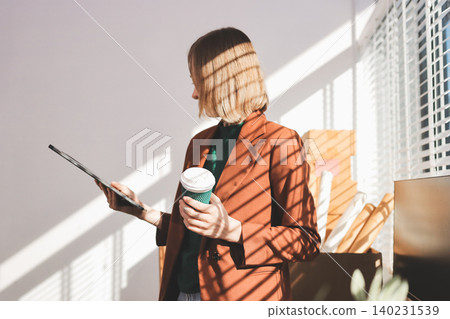 Fashion designer woman and typing on laptop in shop for email project or online order of fabric in creative startup Serious tailor computer and small business for clothes or textile in : Generative AI Fashion designer woman and typing on laptop in shop for email project or online order of fabric in creative startup Serious tailor computer and small business for clothes or textile in : Generative AI 140231539