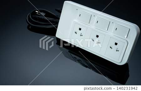 Power strip with three electrical standard socket on black background. White universal plug with overload protection. Fire resistant material for cover. Circuit breaker. Individual switch. Power plug. Power strip with three electrical standard socket on black background. White universal plug with overload protection. Fire resistant material for cover. Circuit breaker. Individual switch. Power plug. 140231942