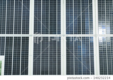 Solar energy for factory and warehouse building. Solar panels on roof of industrial plant. Commercial solar power. Rooftop solar power. Rooftop renewable energy system. Sustainable green energy. Solar energy for factory and warehouse building. Solar panels on roof of industrial plant. Commercial solar power. Rooftop solar power. Rooftop renewable energy system. Sustainable green energy. 140232214