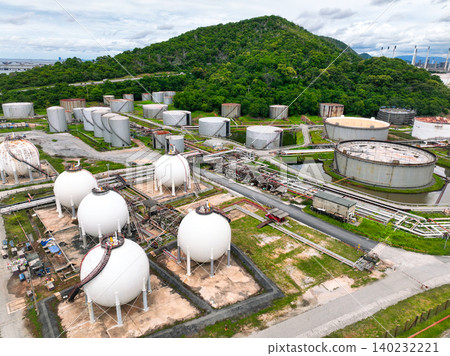 Industrial gas storage tank. LNG or liquefied natural gas storage tank. Gas tank in petroleum refinery. Natural gas storage industry. Energy infrastructure and petroleum reserves in global market. 140232221