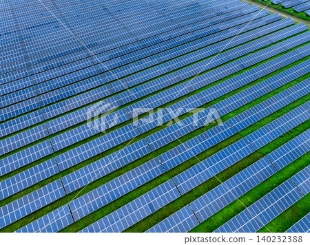 Aerial view of solar farm. Sustainable renewable energy and modern photovoltaic technology for eco-friendly electricity production. Solar power station. Green energy solutions. Solar panel technology. Aerial view of solar farm. Sustainable renewable energy and modern photovoltaic technology for eco-friendly electricity production. Solar power station. Green energy solutions. Solar panel technology. 140232388