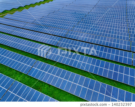 Aerial view of solar farm. Sustainable renewable energy and modern photovoltaic technology for eco-friendly electricity production. Solar power station. Green energy solutions. Solar panel technology. Aerial view of solar farm. Sustainable renewable energy and modern photovoltaic technology for eco-friendly electricity production. Solar power station. Green energy solutions. Solar panel technology. 140232397