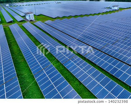 Aerial view of solar farm. Sustainable renewable energy and modern photovoltaic technology for eco-friendly electricity production. Solar power station. Green energy solutions. Solar panel technology. Aerial view of solar farm. Sustainable renewable energy and modern photovoltaic technology for eco-friendly electricity production. Solar power station. Green energy solutions. Solar panel technology. 140232398