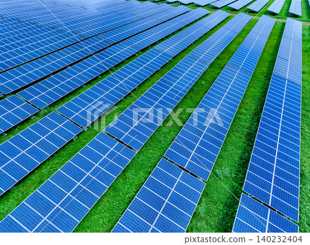 Aerial view of solar farm. Sustainable renewable energy and modern photovoltaic technology for eco-friendly electricity production. Solar power station. Green energy solutions. Solar panel technology. Aerial view of solar farm. Sustainable renewable energy and modern photovoltaic technology for eco-friendly electricity production. Solar power station. Green energy solutions. Solar panel technology. 140232404