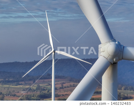 Wind energy and sustainable power generation with wind turbines, Eco-friendly solutions for renewable resources. Wind power farm and sustainable development of renewable energy, green technology. 140232483