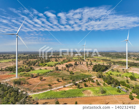 Wind energy and sustainable power generation with wind turbines, Eco-friendly solutions for renewable resources. Wind power farm and sustainable development of renewable energy, green technology. 140232492