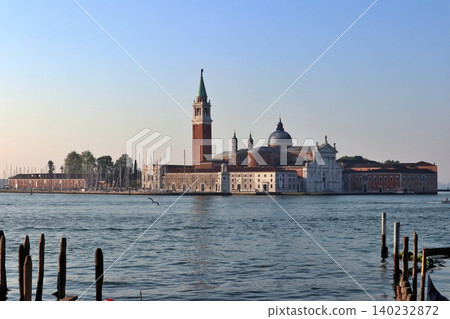 Italy, Venice Old Town, San Giorgio Maggiore Island as seen from the San Marco district in the early morning. Italy, Venice Old Town, San Giorgio Maggiore Island as seen from the San Marco district in the early morning. 140232872