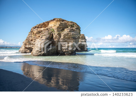 Beach of the Cathedrals, Playa las Catedrales in Ribadeo, province of Lugo, Galicia. Cliff formations on Cantabric coast in northern Spain. Tourist attraction. Beach of the Cathedrals, Playa las Catedrales in Ribadeo, province of Lugo, Galicia. Cliff formations on Cantabric coast in northern Spain. Tourist attraction. 140233623