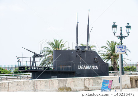 A submarine's conning tower is stored along a palm-tree-lined coastline on the French island of Corsica in the Mediterranean Sea. A submarine's conning tower is stored along a palm-tree-lined coastline on the French island of Corsica in the Mediterranean Sea. 140236472