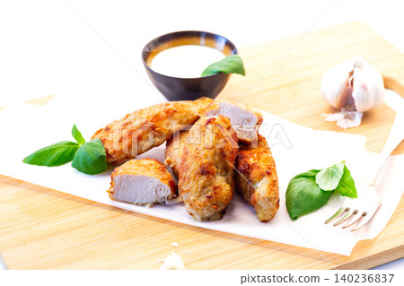 Savory chicken meat with garlic and herbs Savory chicken meat with garlic and herbs 140236837