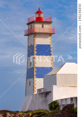 Santa Marta Lighthouse Tower in Cascais Portugal Under Cloudy Sky Santa Marta Lighthouse Tower in Cascais Portugal Under Cloudy Sky 140236850
