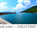 [Kagawa] Summer on Megijima Island: Blue sky and the lighthouse on the east breakwater of Megi Port 140237005