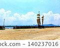 [Kagawa] Megijima Island in summer: The island under clear skies with Takamatsu city visible in the distance. 140237016