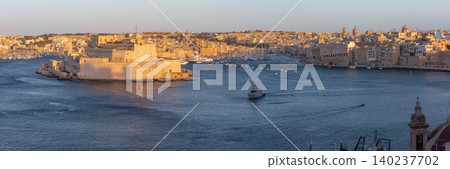 Grand Harbour panorama with Fort Saint Angelo at sunrise in Valletta Malta 140237702