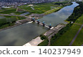 [Drone Aerial Photography] A panoramic view of the Arakawa River, Akigase Intake Weir, and the rich rural landscape (Saitama City, Saitama Prefecture) 140237949