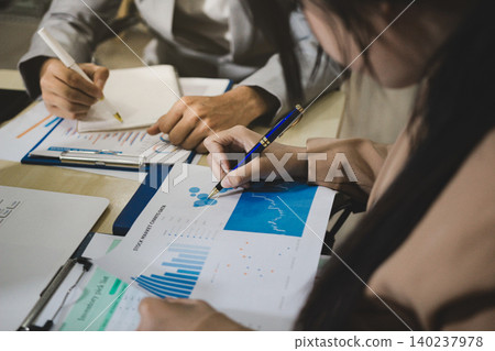 Business accounting concept, Business man using calculator with computer laptop, budget and loan paper in office. Business accounting concept, Business man using calculator with computer laptop, budget and loan paper in office. 140237978