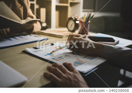 Business accounting concept, Business man using calculator with computer laptop, budget and loan paper in office. Business accounting concept, Business man using calculator with computer laptop, budget and loan paper in office. 140238008