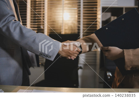 business partner handshake concept Colleagues shaking hands Successful deal after a great meeting. Blurred background. 140238035