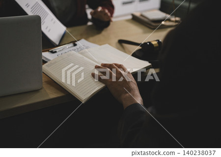 Lawsuit and justice concept, Lawyer  working with partner at law firm. legal consulting discussion defendant punishment law in courtroom 140238037