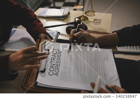 Lawsuit and justice concept, Lawyer  working with partner at law firm. legal consulting discussion defendant punishment law in courtroom 140238047