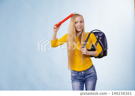 Young woman going to school Young woman going to school 140238161