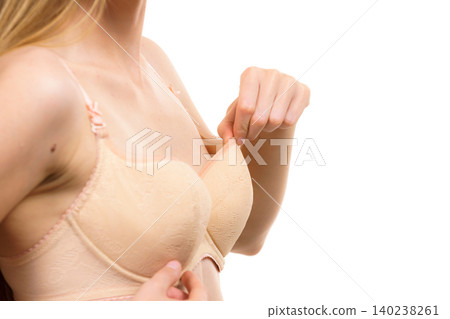 Woman wearing too big bra Woman wearing too big bra 140238261