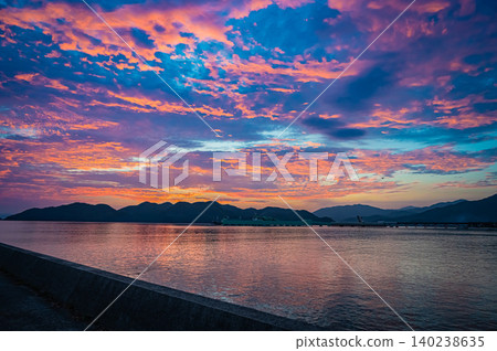 A beautiful harbor scene bathed in the morning light, Nagato City, Yamaguchi Prefecture A beautiful harbor scene bathed in the morning light, Nagato City, Yamaguchi Prefecture 140238635