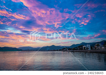 A beautiful harbor scene bathed in the morning light, Nagato City, Yamaguchi Prefecture A beautiful harbor scene bathed in the morning light, Nagato City, Yamaguchi Prefecture 140238643