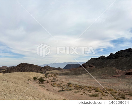 Colorful mountains in Timna Park in the Arava desert Colorful mountains in Timna Park in the Arava desert 140239054