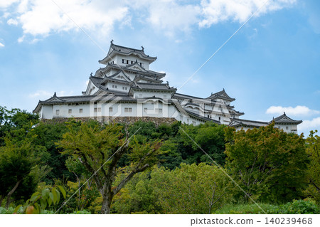 Hyogo Prefecture / The World Heritage site Himeji Castle in autumn, with its beautiful contrast of blue sky, green and white Hyogo Prefecture / The World Heritage site Himeji Castle in autumn, with its beautiful contrast of blue sky, green and white 140239468