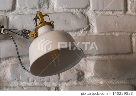 Modern Industrial Wall Lamp on White Painted Brick Wall Modern Industrial Wall Lamp on White Painted Brick Wall 140239838