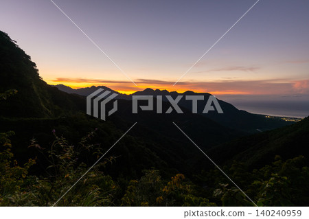The divine sunset over Yakushima Island: Magic Hour (Summer) The divine sunset over Yakushima Island: Magic Hour (Summer) 140240959