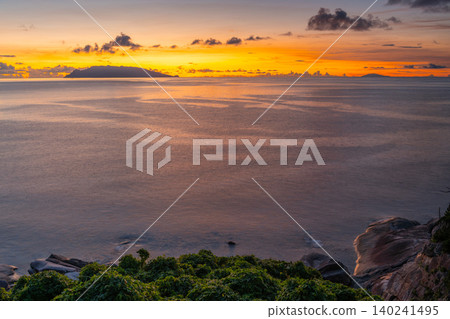 The divine sunset over Yakushima Island: Magic Hour (Summer) The divine sunset over Yakushima Island: Magic Hour (Summer) 140241495