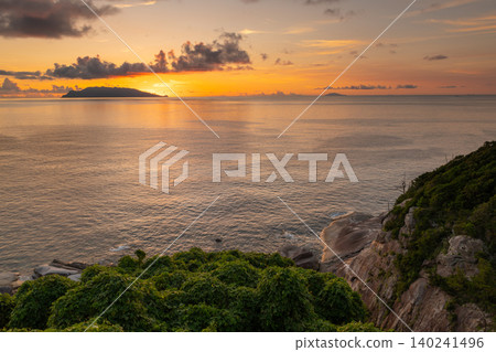 The divine sunset over Yakushima Island: Magic Hour (Summer) The divine sunset over Yakushima Island: Magic Hour (Summer) 140241496