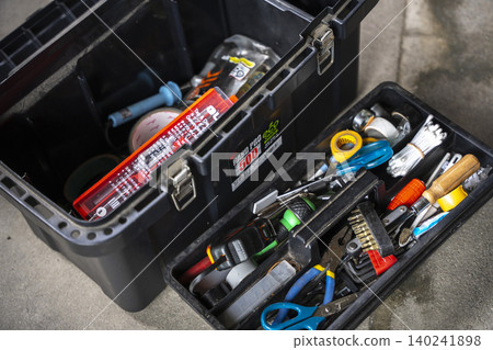 Toolbox is disorganized and messy. Toolbox is disorganized and messy. 140241898