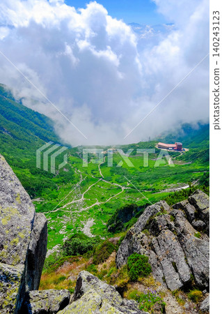 Cloudy summer scenery of Senjojiki Cirque (vertical view) Cloudy summer scenery of Senjojiki Cirque (vertical view) 140243123