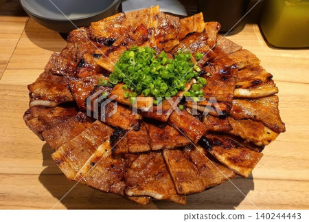 Delicious Japanese Butadon Grilled Pork Belly Rice Bowl with Green Onions Delicious Japanese Butadon Grilled Pork Belly Rice Bowl with Green Onions 140244443