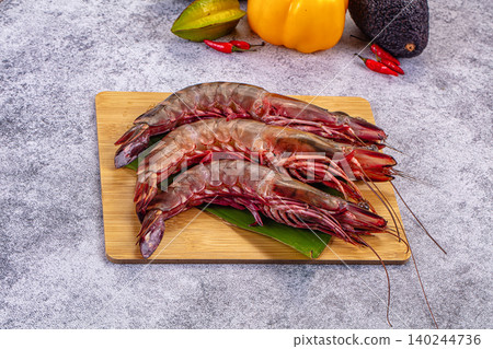 Fresh Tiger Prawns on Bamboo Board with Vegetables Fresh Tiger Prawns on Bamboo Board with Vegetables 140244736