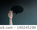 Holding blank speech bubble in dark , Social pressure, emotional expression, mental health 140245286