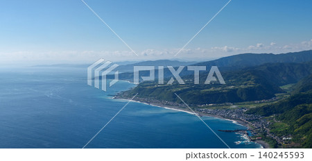 A cove and coastal settlement in southeastern Kochi Prefecture bathed in light A cove and coastal settlement in southeastern Kochi Prefecture bathed in light 140245593