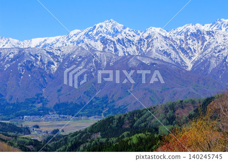 The Northern Alps from Hakuba Village in May; the mountains of Shinshu; the scenery of Shinshu. The Northern Alps from Hakuba Village in May; the mountains of Shinshu; the scenery of Shinshu. 140245745