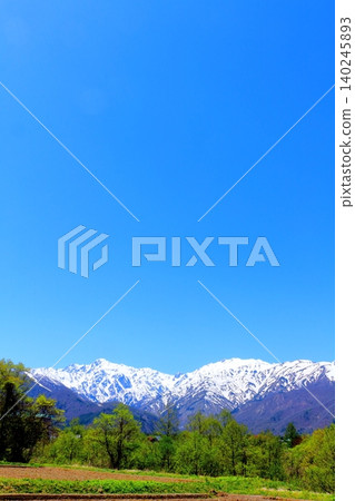The Northern Alps from Hakuba Village in May; the mountains of Shinshu; the scenery of Shinshu. The Northern Alps from Hakuba Village in May; the mountains of Shinshu; the scenery of Shinshu. 140245893