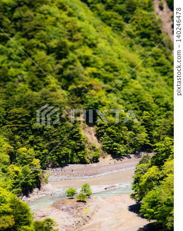 The dream suspension bridge, beautifully framed by the fresh greenery, in Sumata Gorge The dream suspension bridge, beautifully framed by the fresh greenery, in Sumata Gorge 140246478