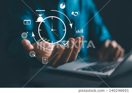 Management of time and productivity tools helps business professional workflow planning tasks, digital clock icons over laptop show effective work management for company success and growth Management of time and productivity tools helps business professional workflow planning tasks, digital clock icons over laptop show effective work management for company success and growth 140246691