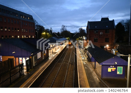 The railway tracks continue before dawn. The railway tracks continue before dawn. 140246764