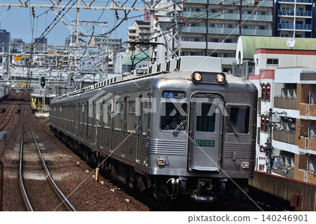 Nankai Koya Line 6000 series train with retro design arriving at Shin-Imamiya station. Nankai Koya Line 6000 series train with retro design arriving at Shin-Imamiya station. 140246901