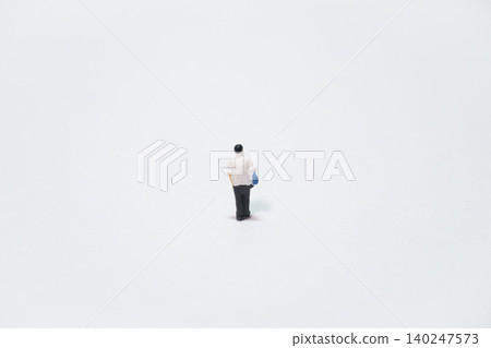 Miniature of a high school boy and a large blank space Miniature of a high school boy and a large blank space 140247573