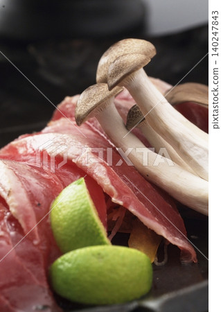 Fresh raw duck meat slices, shimeji mushrooms, and sudachi citrus. Fresh raw duck meat slices, shimeji mushrooms, and sudachi citrus. 140247843